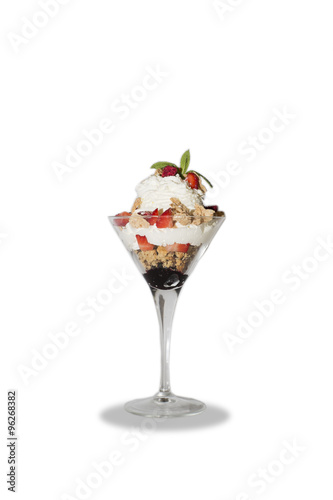 Sundae with cream, strawberries and cornflakes