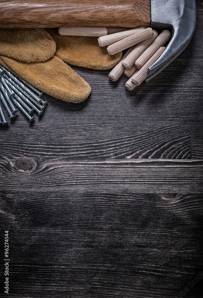 Safety gloves metal construction nails claw hammer wooden dowels Safety gloves metal construction nails claw hammer wooden dowels