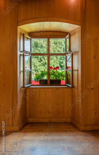 Open Window with Flowers in Wooden Interior
