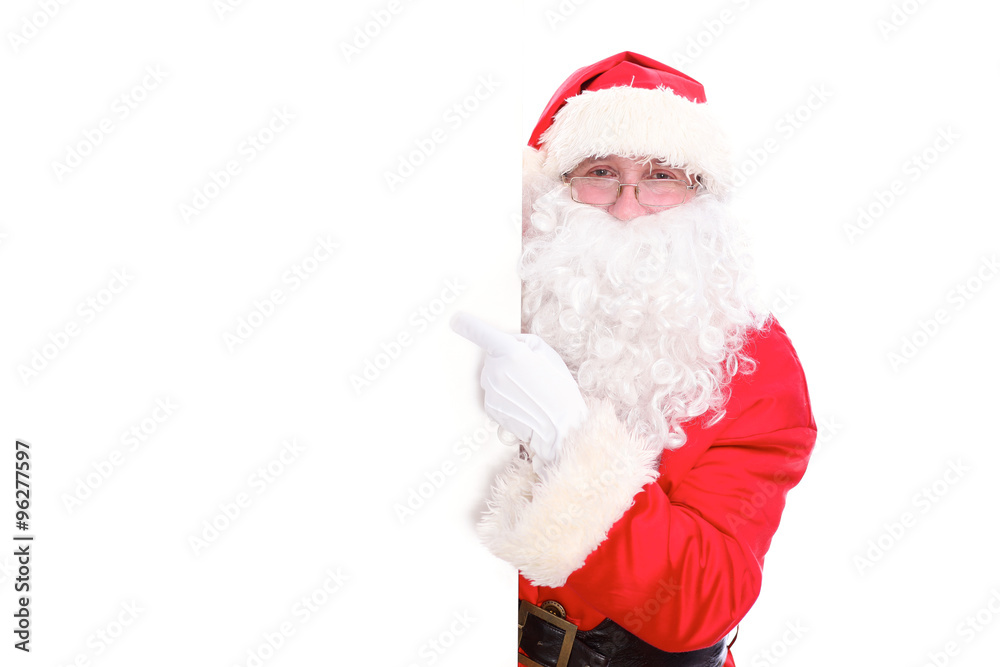 Kind Santa Claus pointing in white blank sign, isolated on white background Kind Santa Claus pointing in white blank sign, isolated on white background