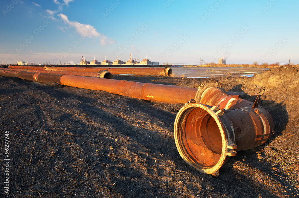 Nuclear power plant units, pipes & coal piles Nuclear power plant units, pipes & coal piles