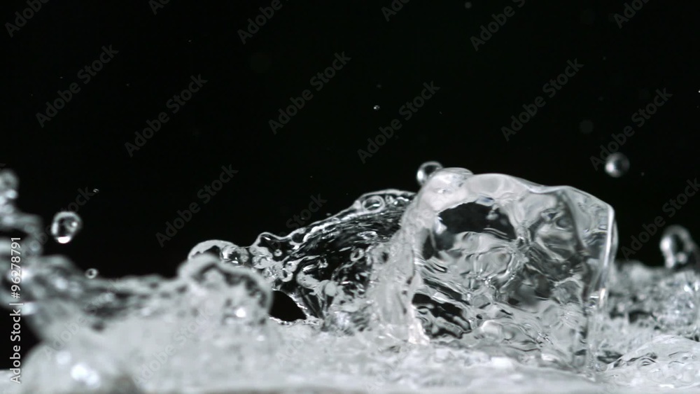Water splash and ice cube shooting with high speed camera.