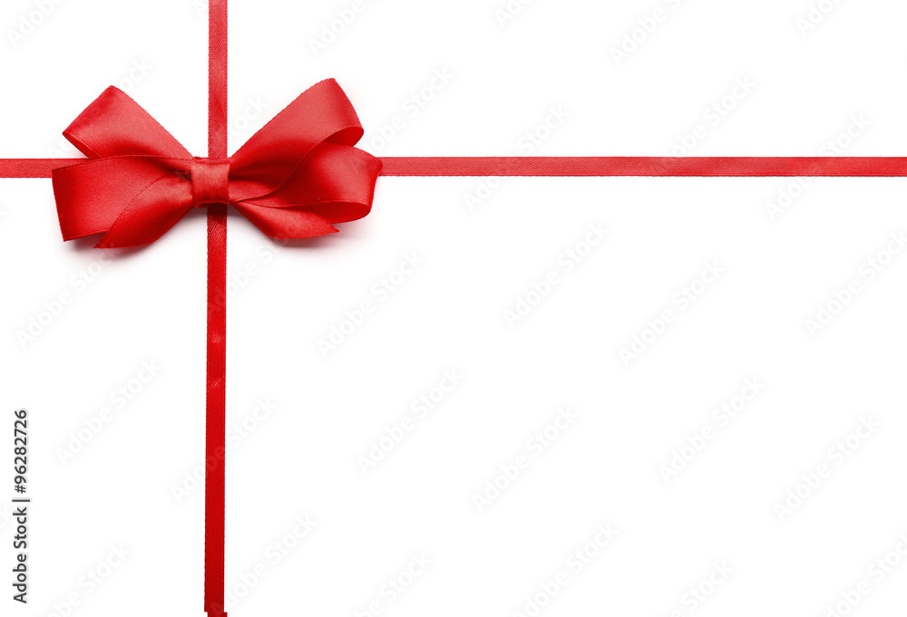 Shiny red ribbon with bow isolated on white Shiny red ribbon with bow isolated on white