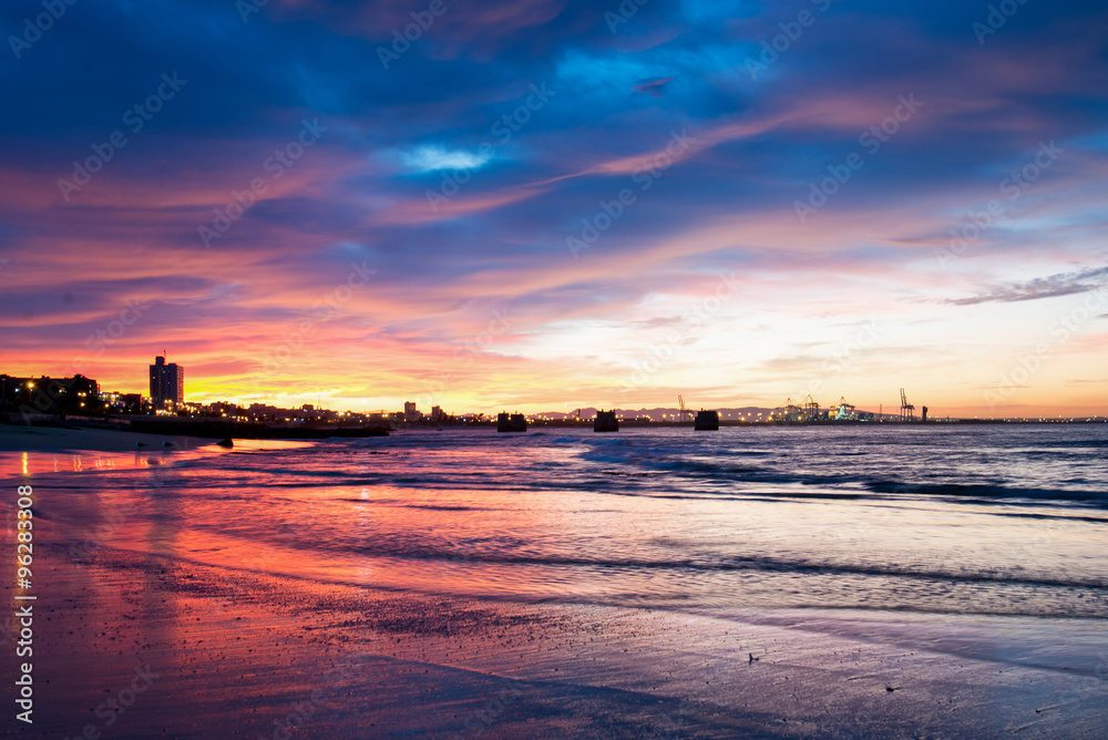 Fototapeta premium Sunset over Port Elizabeth coast line, South Africa.