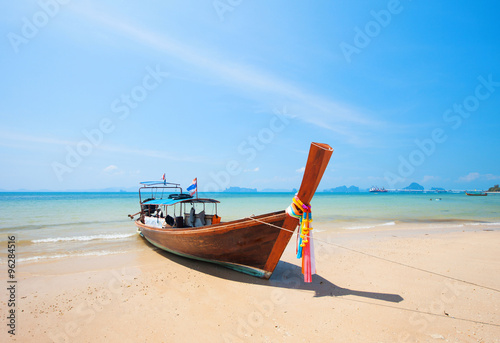 longtail boat and beautiful beach © Alexander Ozerov