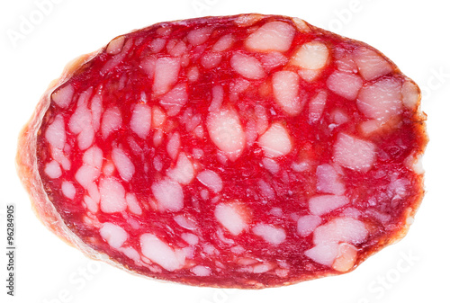 Quadro su tela cut off slice of smoked sausage isolated
