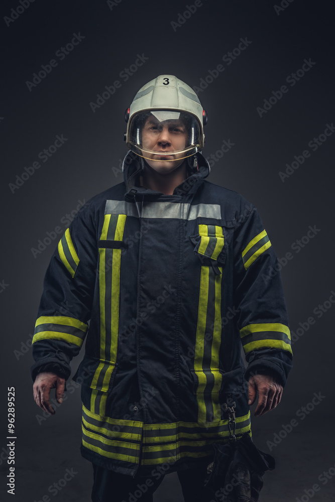 Picture of firefighter in uniform. Picture of firefighter in uniform.