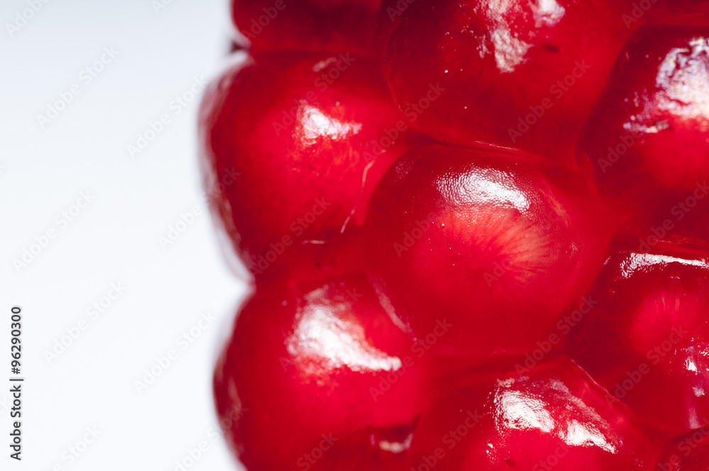 Garnet seeds on the white background. Garnet seeds on the white background.