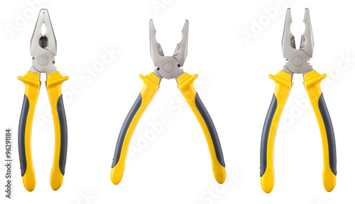  three yellow and  black pliers isolated  photo