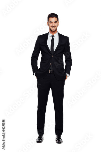 elegant man in black suit, on white