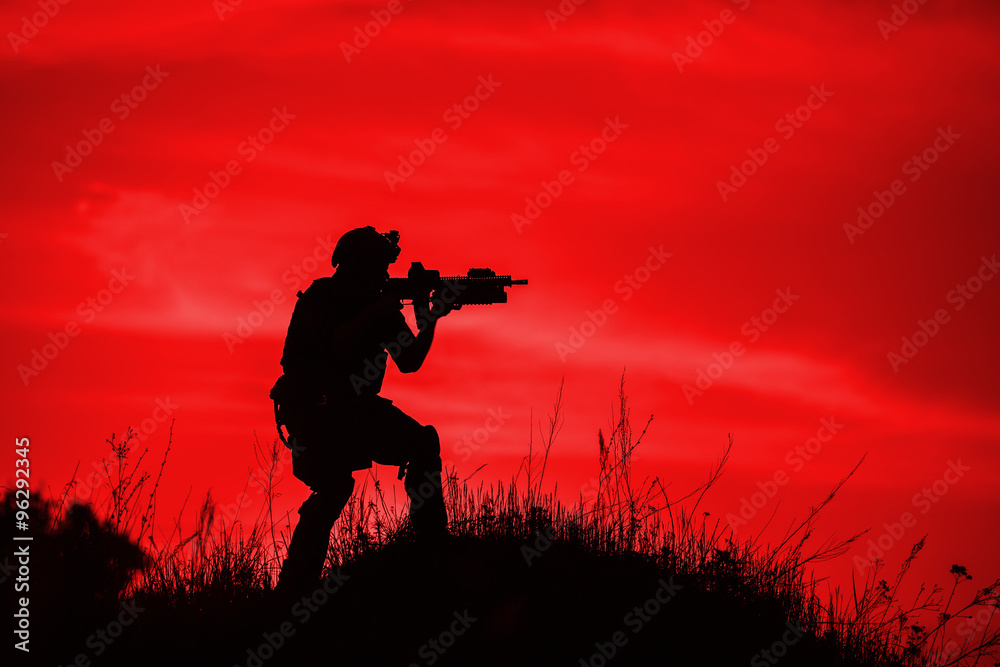 Silhouette of soldier with rifle..