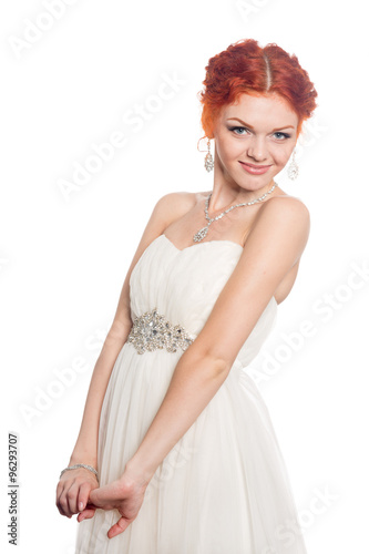 Smiling girl in a wedding dress