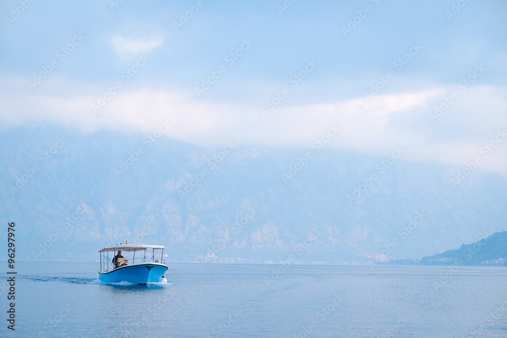 The image of boat in a Kotor  bay, Montenegro