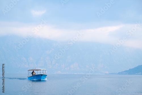 The image of boat in a Kotor  bay, Montenegro © Dmitry Vereshchagin