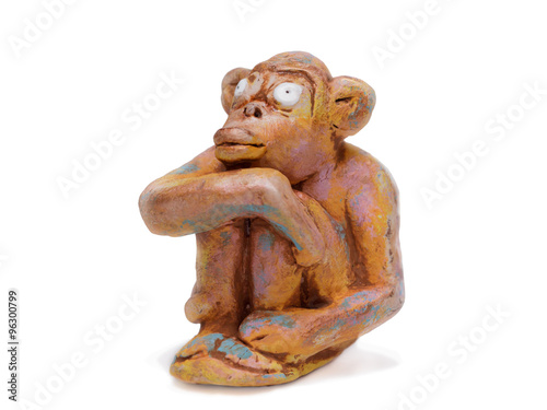 dreamy monkey  from clay pottery isolated on white