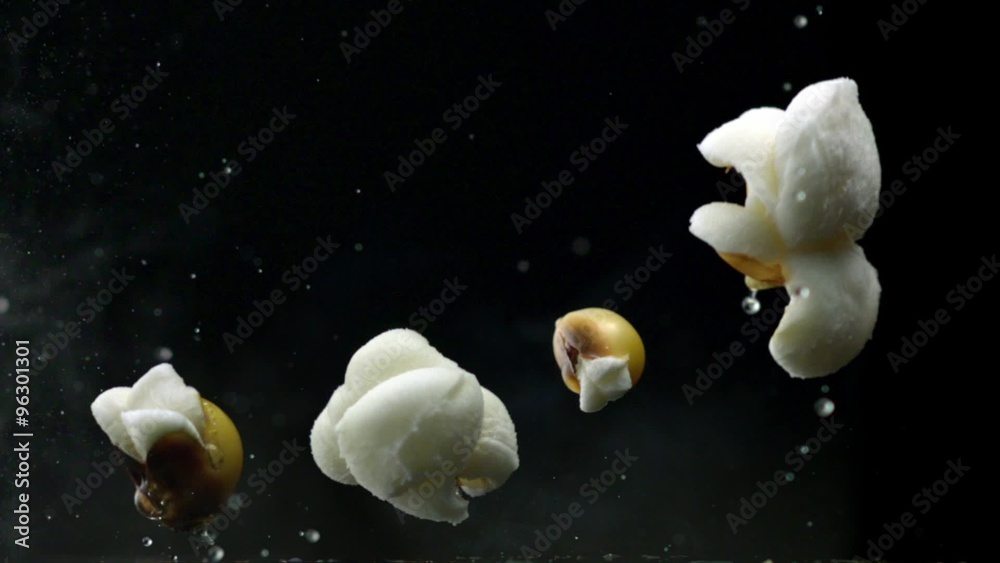 Popcorn popping on black background shooting with high speed camera, phantom flex.