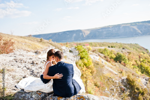 Very sensual and gorgeus wedding couple on the picturesque lands © AS Photo Family