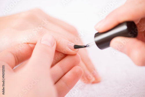 Professional manicurist making manicure 
