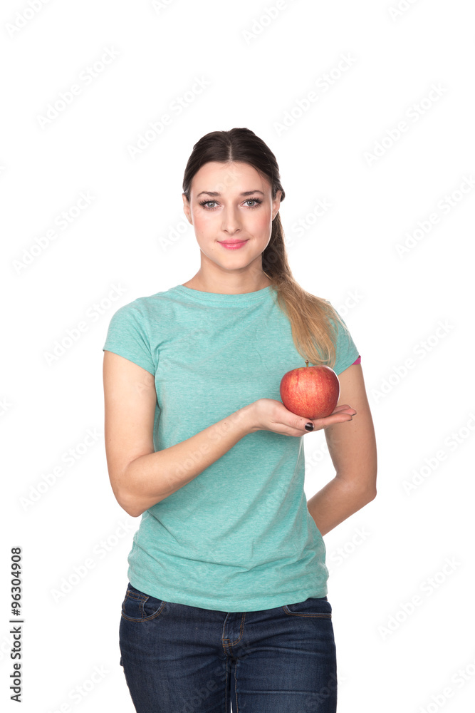 The girl and an apple isolated on white The girl and an apple isolated on white