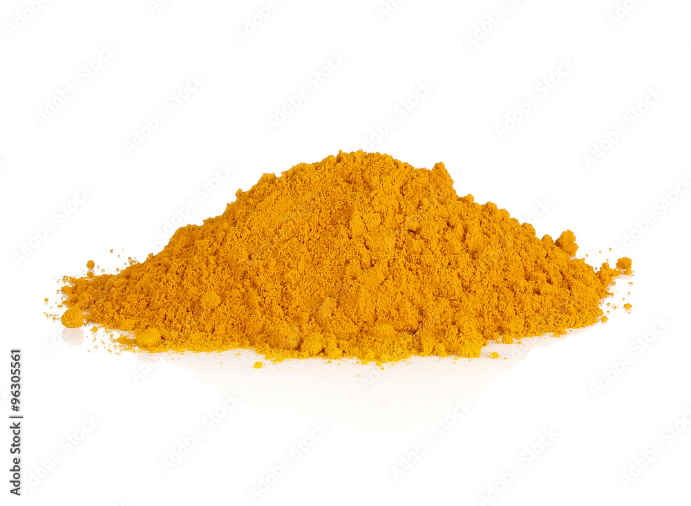 Turmeric powder spice pile isolated on white background Turmeric powder spice pile isolated on white background