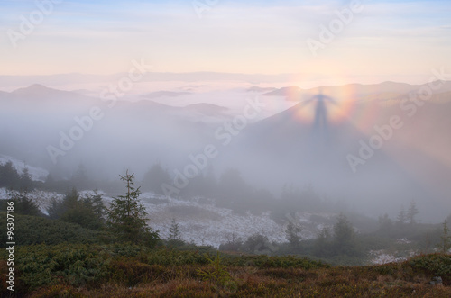 Autumn landscape with beautiful phenomenon in fog