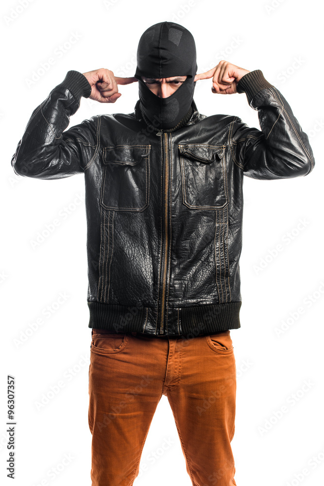 Robber covering his ears