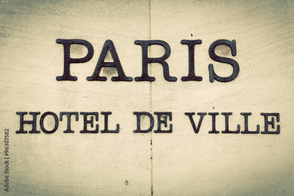 Paris Hotel de Ville - Parisian city hall inscription on the building. Vintage Paris Hotel de Ville - Parisian city hall inscription on the building. Vintage
