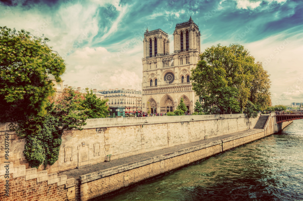 Notre Dame Cathedral in Paris, France and the Seine river. Vintage