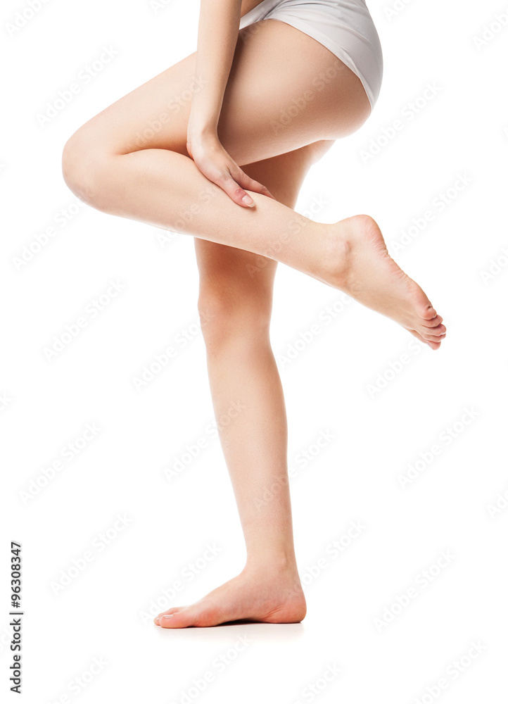 Beautiful wet feet, women legs on white background