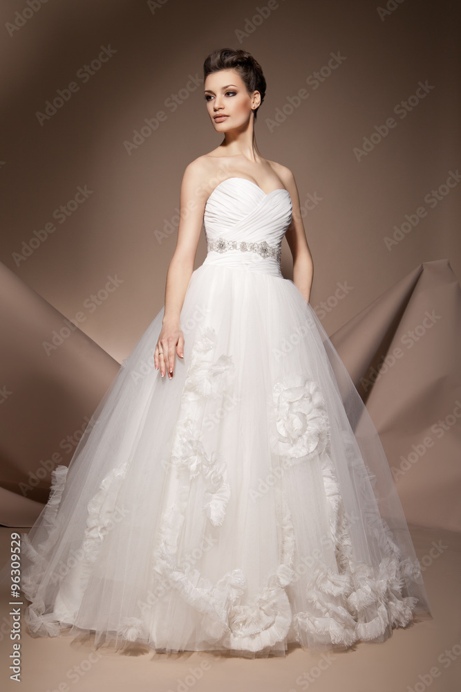 The beautiful young woman in a wedding dress The beautiful young woman in a wedding dress