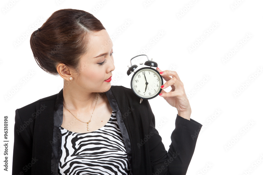 Young Asian business woman smile with a clock Young Asian business woman smile with a clock