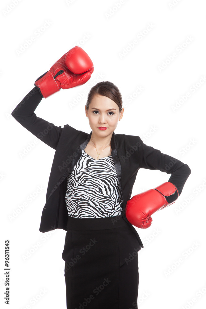 Young Asian business woman with red boxing gloves