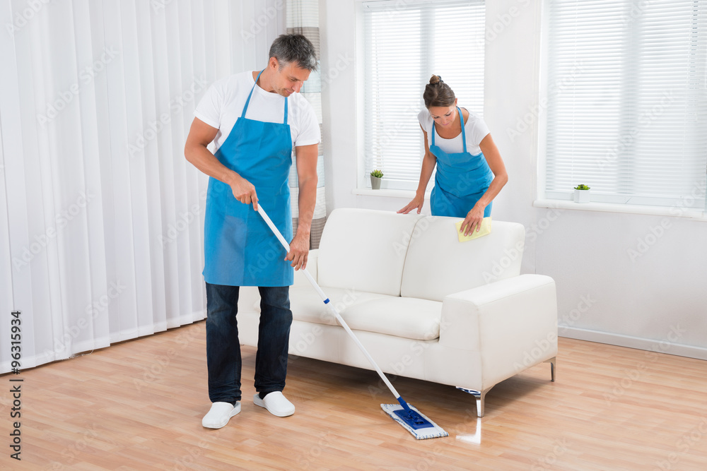 Two Cleaners Cleaning Office