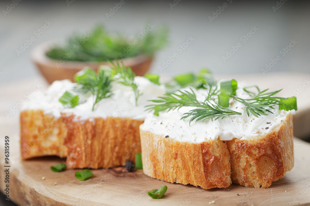 crunchy baguette slices with cream cheese and herbs crunchy baguette slices with cream cheese and herbs