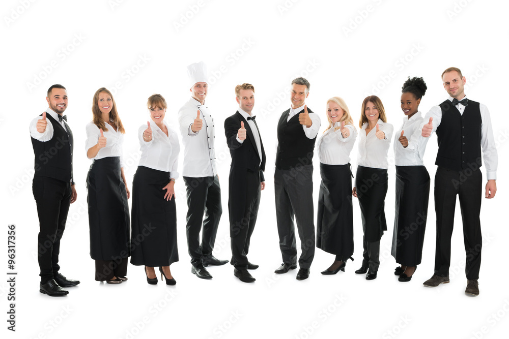 Portrait Of Confident Restaurant Staff Standing In Row Portrait Of Confident Restaurant Staff Standing In Row