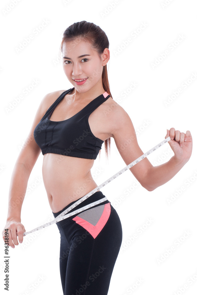 Fitness young woman taking measurements of her body. healthy concept Fitness young woman taking measurements of her body. healthy concept