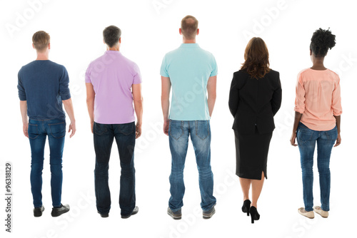 Rear View Of Creative Business People Standing With Manager