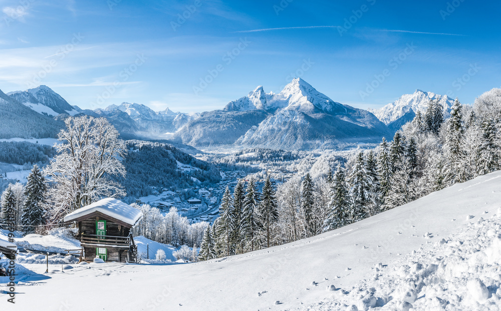 Fototapeta premium Idyllic winter landscape in the Alps with traditional mountain chalet