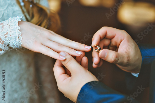 The exchange of rings during an Orthodox wedding, the priest wears the ring bride and groom, wedding day, the church