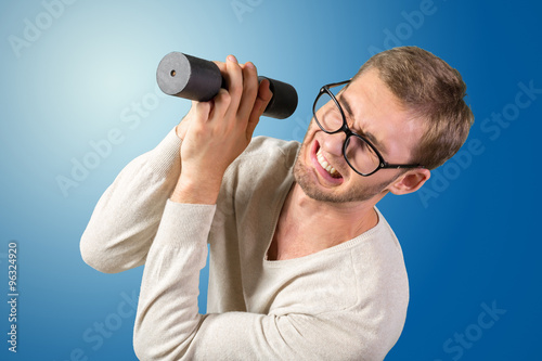 Funny weak man tries to lift a weight