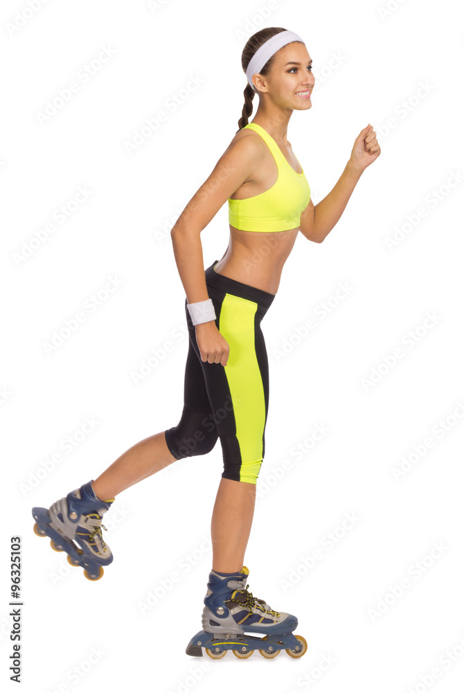 Sporty young girl with roller skates Sporty young girl with roller skates