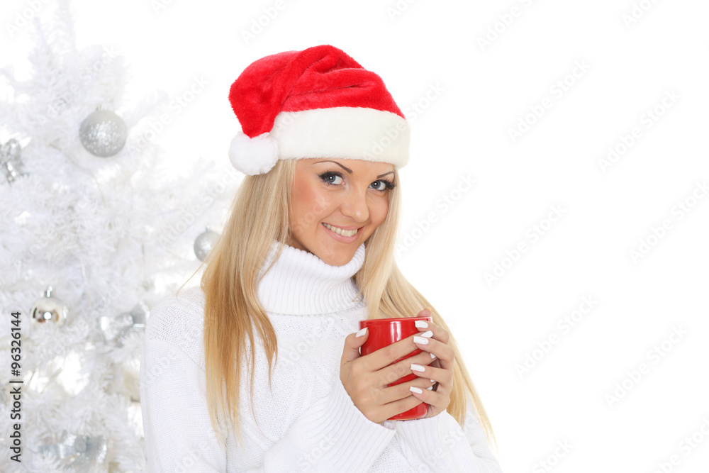 Young woman in Santa Claus cap. Young woman in Santa Claus cap.