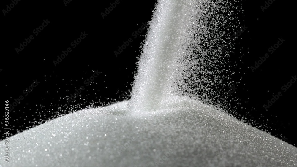 Pile of sugar on black background shooting with high speed camera, phantom flex.