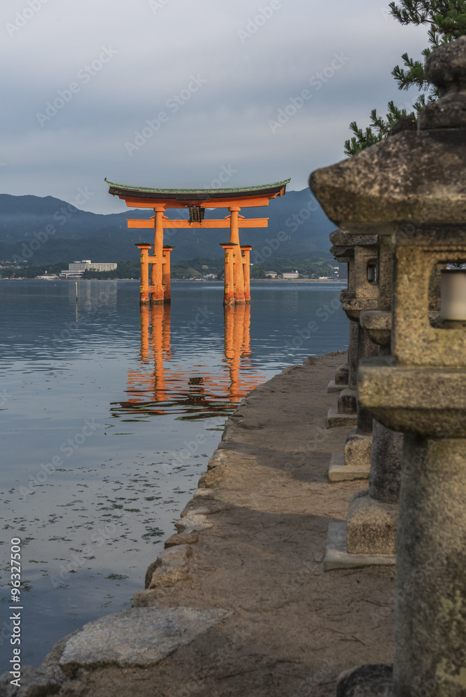 Early morning at the famous floating torii gate of the Itsukushi Early morning at the famous floating torii gate of the Itsukushi