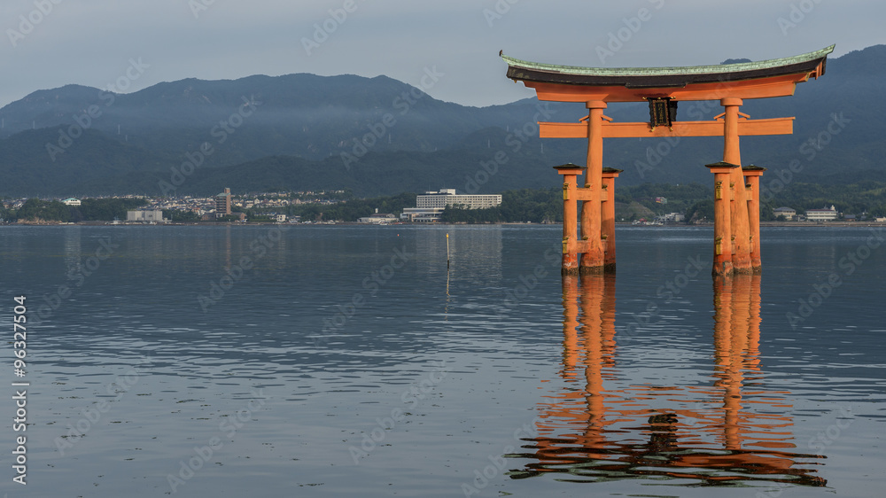 Early morning at the famous floating torii gate of the Itsukushi Early morning at the famous floating torii gate of the Itsukushi