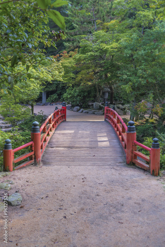 Traditional Japanese style bridge at the entrance to Momiji-dani