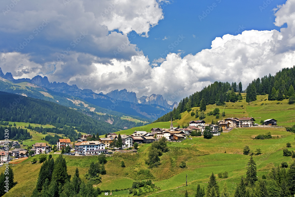 view over the meadows and agriculture in the dolomite alpes