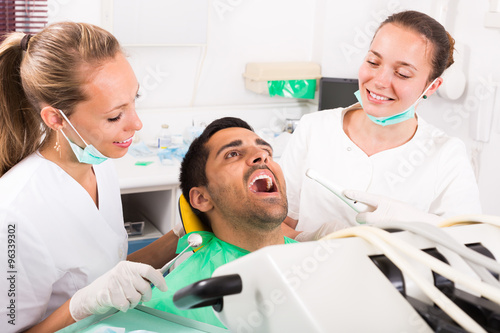 Patient is examined at dental clinic