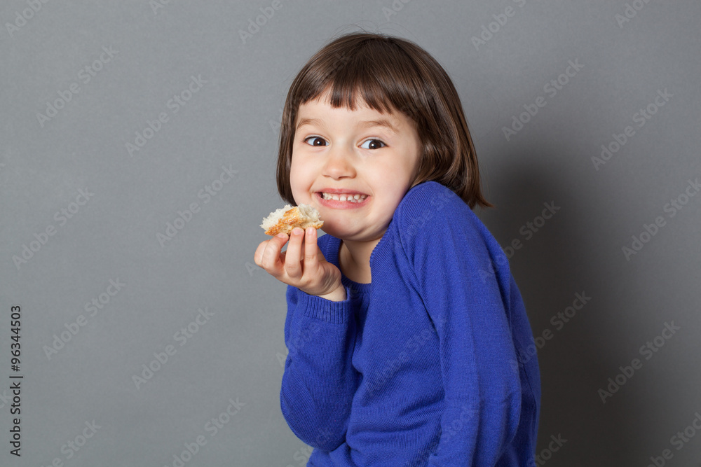 kid fun concept - adorable preschool child stealing a piece of bread for fun and enjoying silly things,studio shot kid fun concept - adorable preschool child stealing a piece of bread for fun and enjoying silly things,studio shot