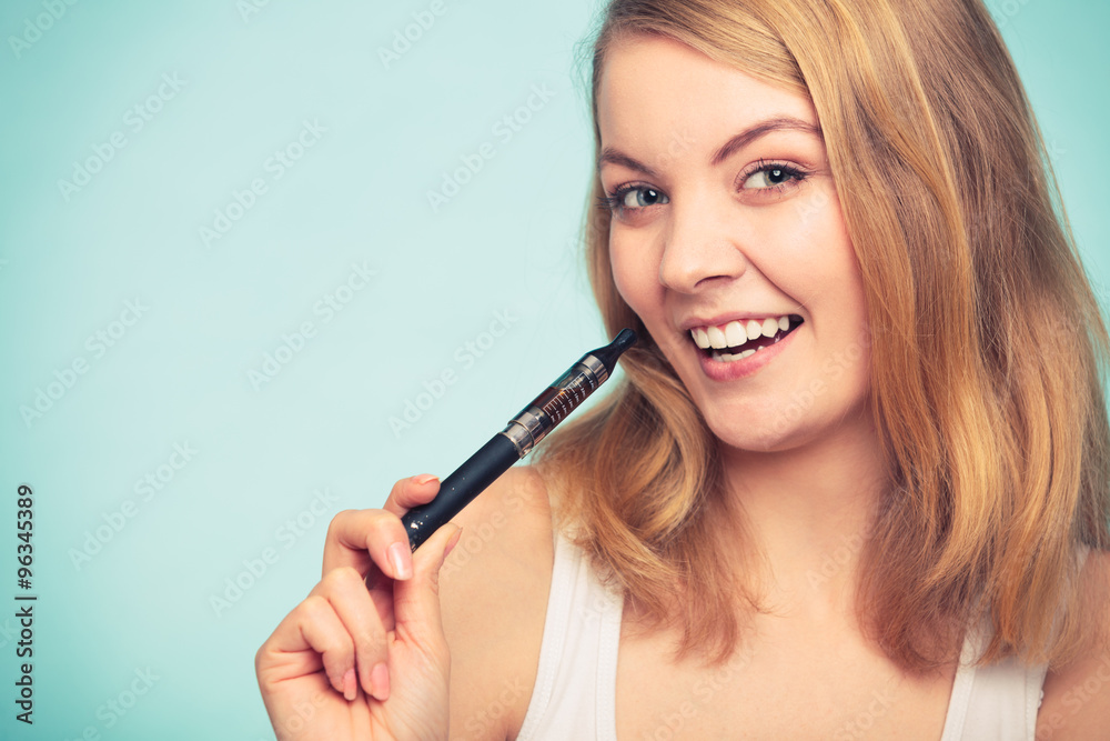 Girl with normal and electronic cigarette. Girl with normal and electronic cigarette.